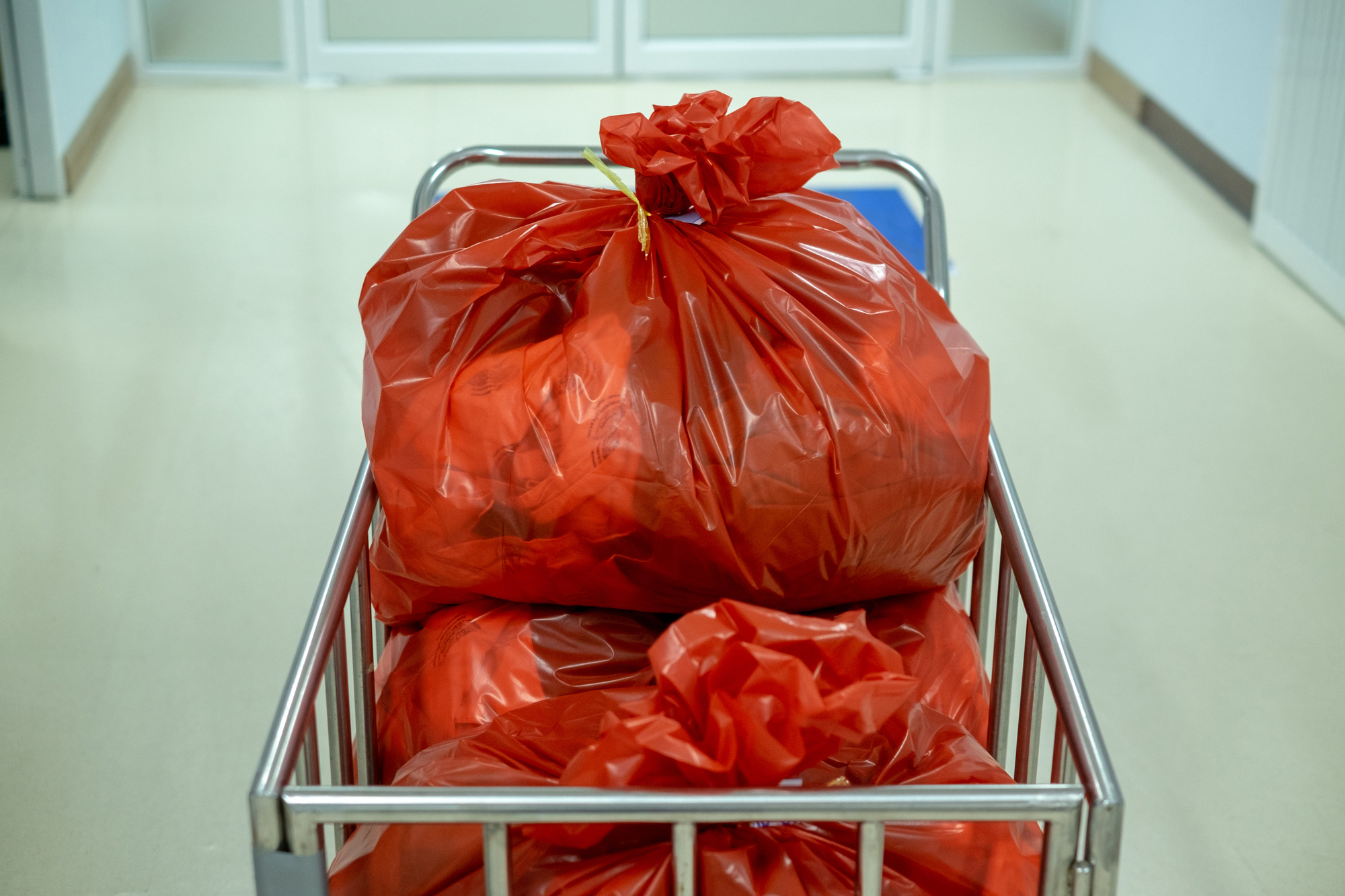 bag in cart after Affordable Red Bag Disposal for Clearwater, FL ​