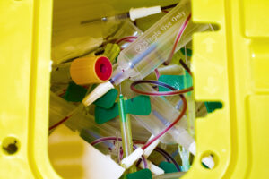 sharps container and used needles ready for pickup during Biomedical Waste Removal in Ocoee, FL