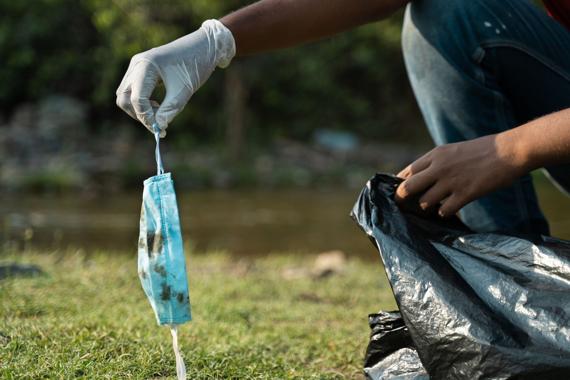 picking up trash provided by Medical Waste Disposal Company in Orlando, FL​